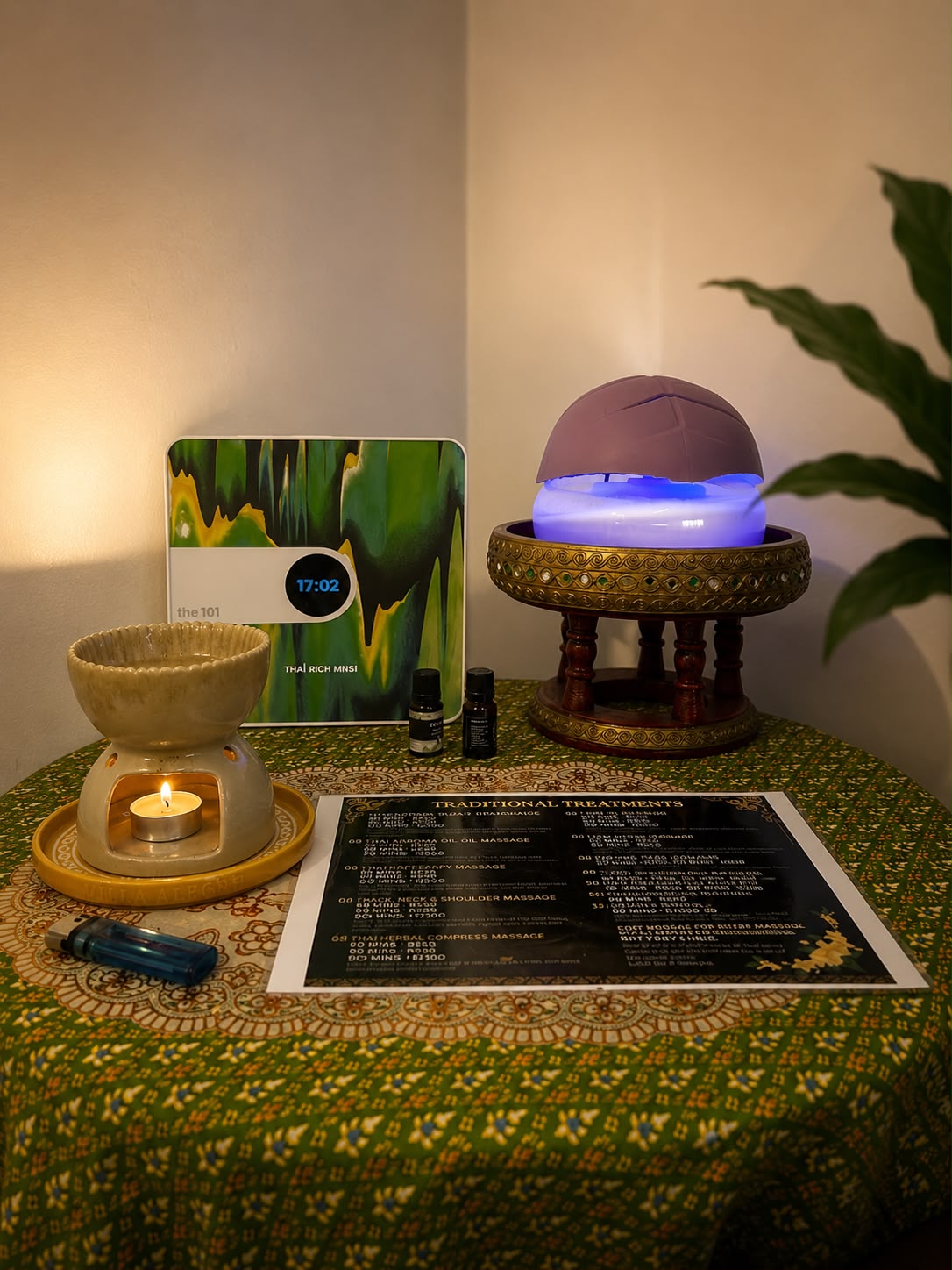 Aromatherapy corner with oil burner, essential oils and the traditional treatments menu
