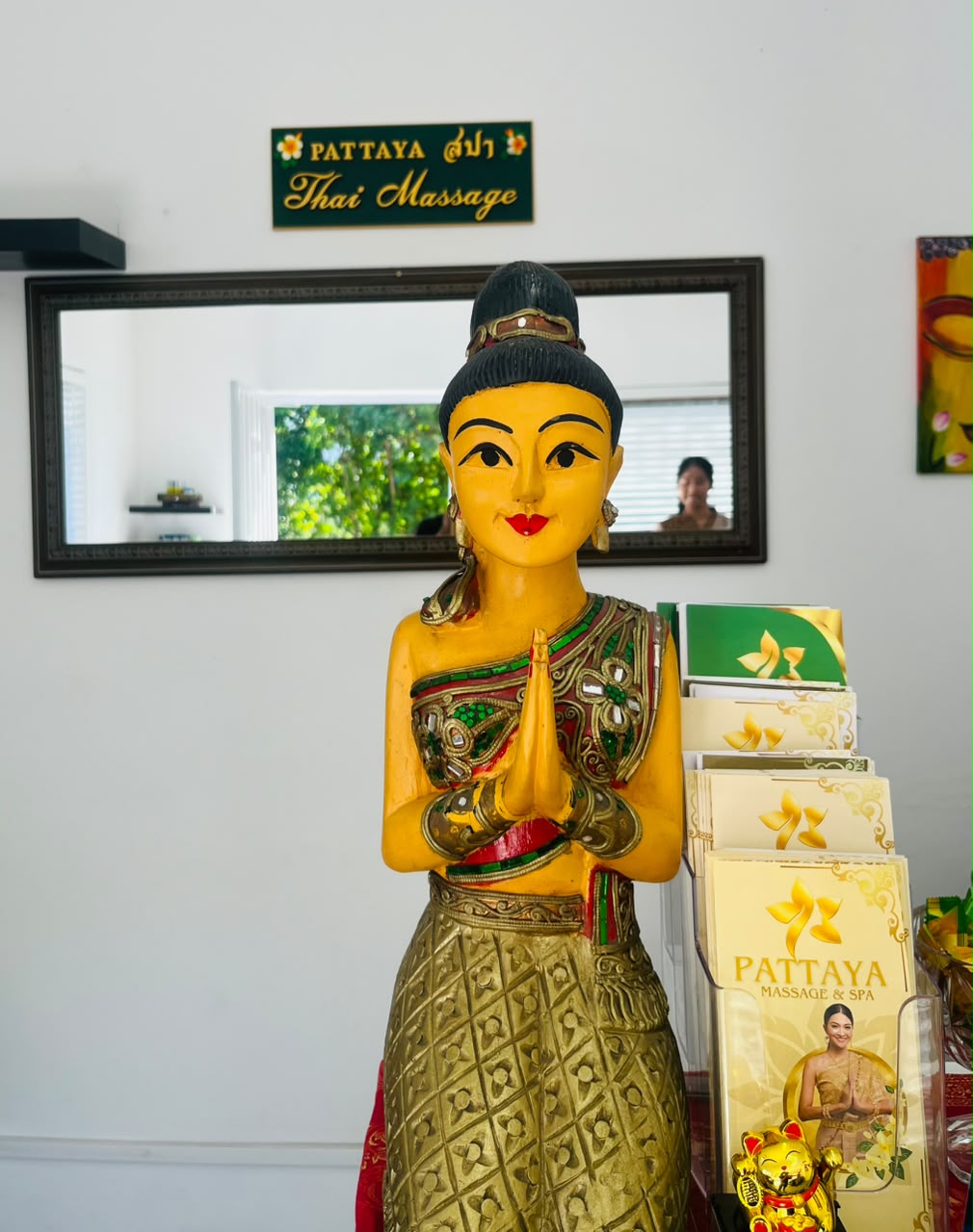 Traditional Thai female statue decorating the Pattaya spa lobby entrance